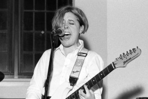 BRYN MAWR, PA - MARCH, 1996: American singer, songwriter, and guitarist Corin Tucker, of the American rock band Sleater-Kinney, plays on stage circa March, 1996 in Byrn Mawr, Pennsylvania. (Photo by Bob Berg/Getty Images)