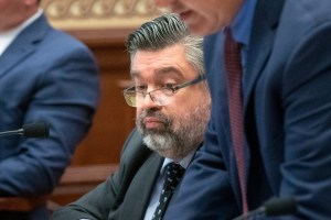 David Warrington, center, and Theodore Boecker, right, lawyers representing Charles Herbster; and David Lopez, left, a lawyer representing State Sen. Julie Slama, are seen in court, June 14, 2022, in Beatrice, Neb. (Justin Wan/Lincoln Journal Star via AP)