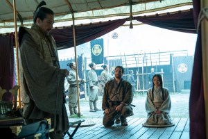 “SHOGUN” --  "A Stick of Time" -- Episode 7 (Airs April 2)  Pictured:   Hiroyuki Sanada as Yoshii Toranaga, Cosmo Jarvis as John Blackthorne, Anna Sawai as Toda Mariko.  CR: Katie Yu/FX