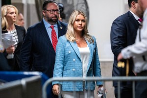Trump campaign press secretary Karoline Leavitt (C) and Trump adviser Jason Miller (L) arrive at the criminal trial of former US President and Republican presidential candidate Donald Trump's criminal trial at Manhattan Criminal Court in New York City on May 29, 2024. Jurors in Trump's hush money trial begin deliberating today on whether to return the first criminal conviction of a former president -- a momentous decision that could upend the November presidential election. (Photo by Doug Mills / POOL / AFP) (Photo by DOUG MILLS/POOL/AFP via Getty Images)